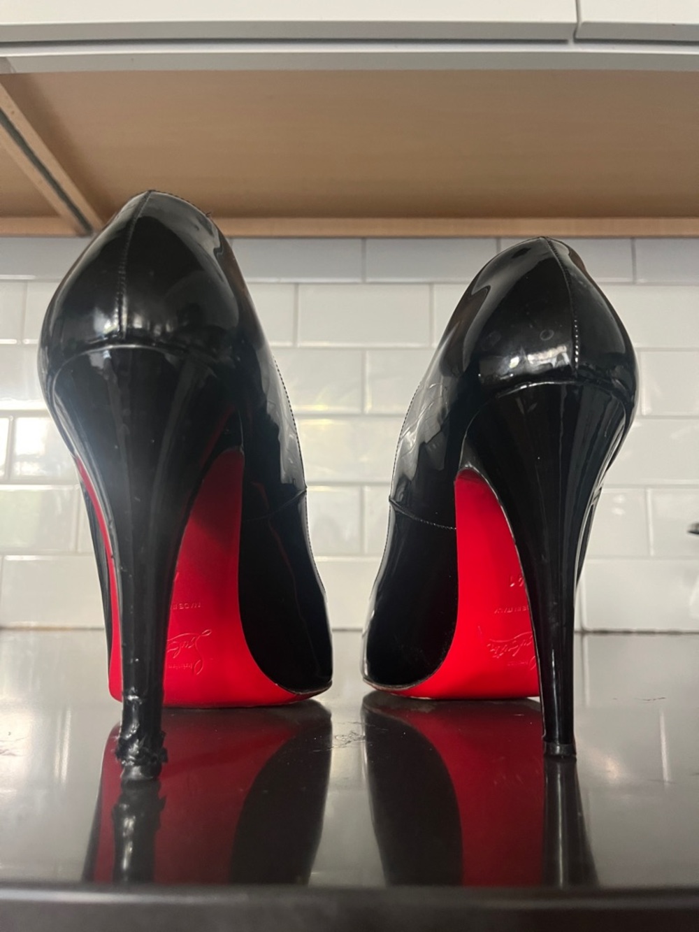 Christian Louboutin Black Patent Stiletto Pumps with Signature Red Soles
